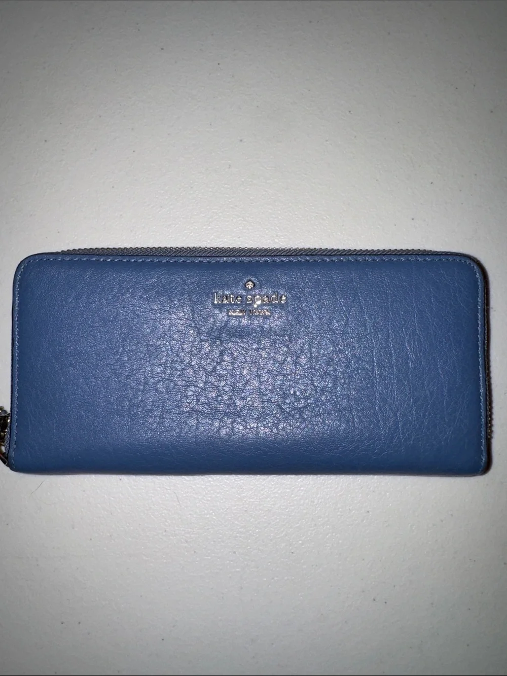 kate spade blue pebbled leather zip-around wallet with wristlet